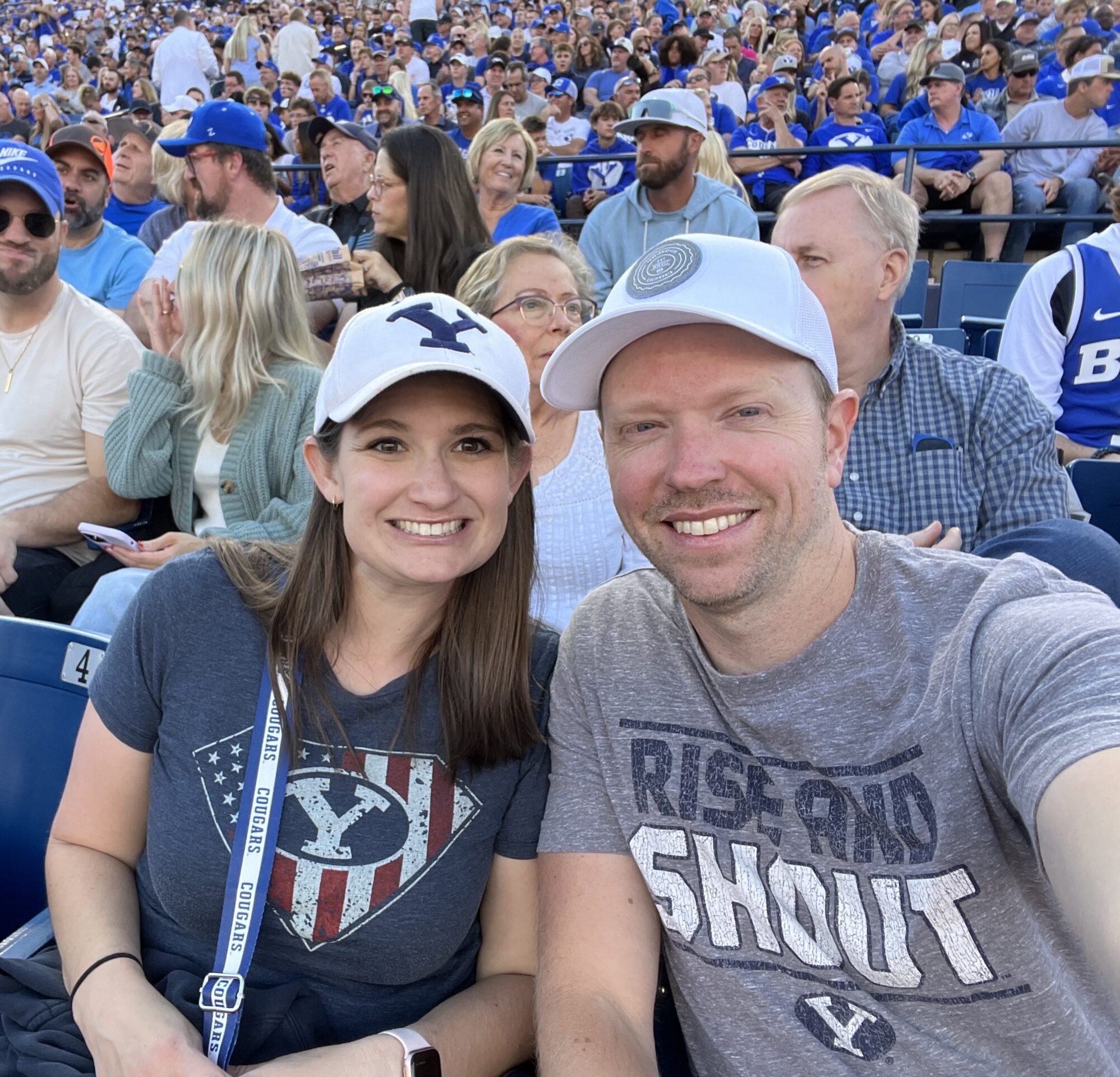 Dr. Prince, credible orthodontist in American Fork, engaging in the community at a BYU game