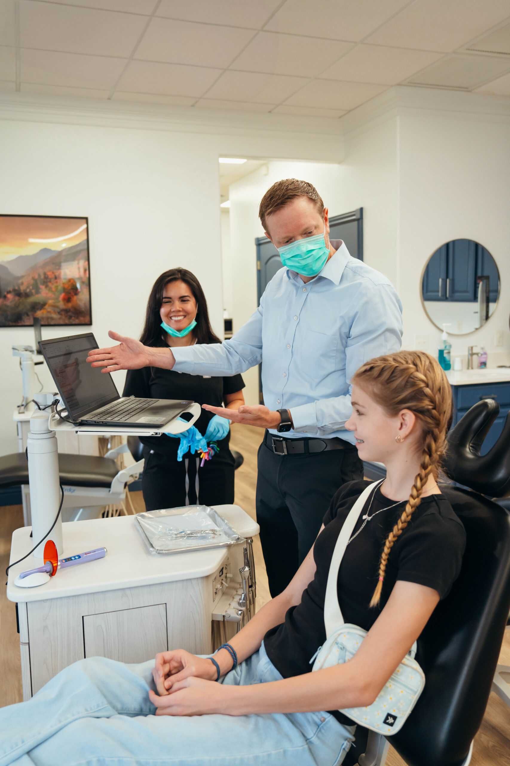 Dr. Prince reviewing dental X-rays with a patient at Prince Orthodontics in American Fork for personalized treatment planning.